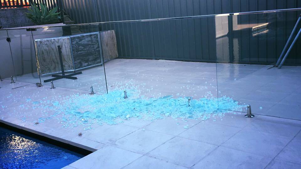 Pool fence shatters spontaneously.