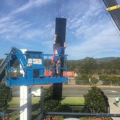 Glass awning being repaired